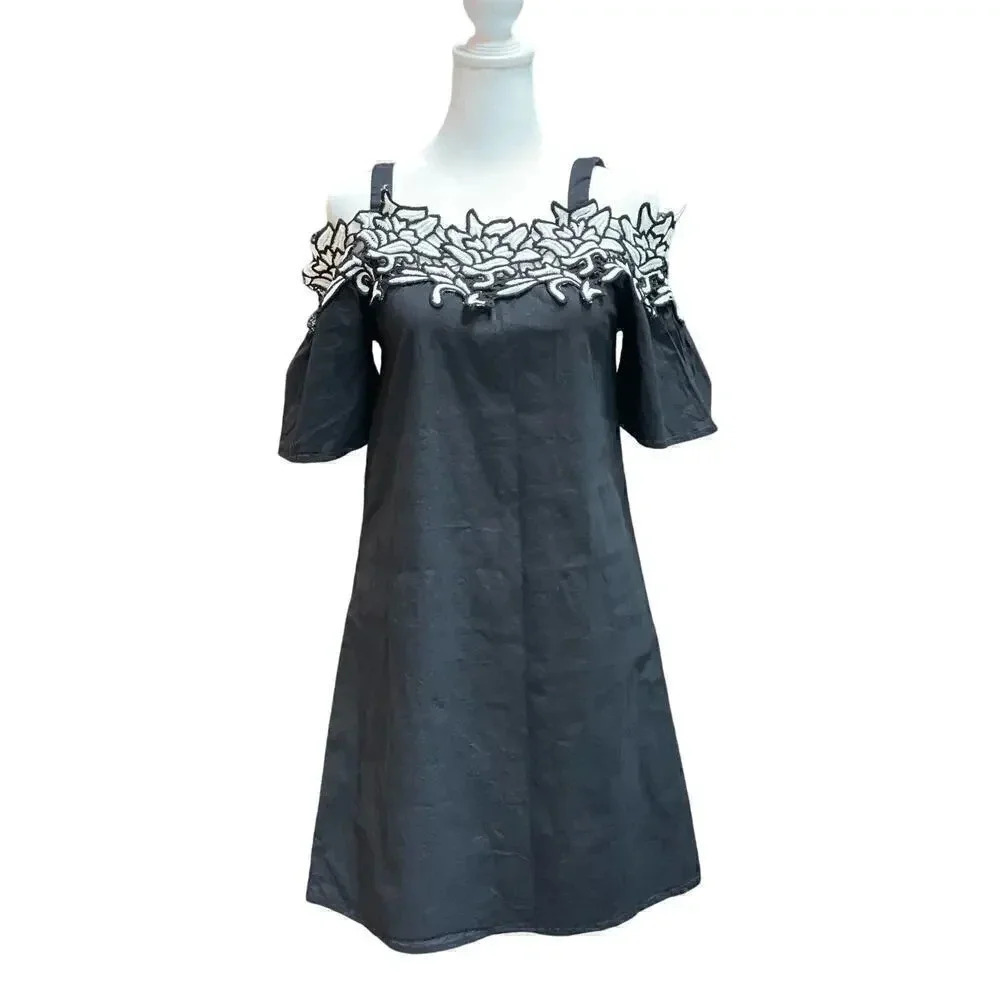 Potter’s Pot off shoulder dress.